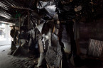 Abigail DeVille, Gastown Follies, 2013. Alley trash, reclaimed metal, free paint, accumulated debris.