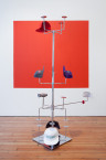 Alex Da Corte, <em>Soft Alert Palimpsest (Six Characters in Search of an Author)</em>, 2013. Millinery display stand, steel, hair scrunchie, flashlight, embroidered baseball caps, latex paint, Catwoman cardboard cutout, colour Xerox, thumb tacks, adhesive mirror vinyl